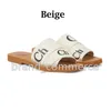 Dames Woody slides Designer canvas rubberen slippers wit zwart bruin roze zeil dames muildieren platte sandalen mode buiten strandschoenen