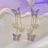Dingle örhängen 1 par fjärilar tofs kvinnor lyx elegant lång faux lila kristallflickor dropp studmodelsmycken
