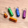 Mini Mini Aluminium Aluminy Pill Pill Box Carrtridge Keychain Outdoor مقاوم للماء محكم الأدوية