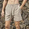 Shorts masculinos verão grande bolso de malha retro cintura elástica esportes solto casual trimestre calças pantalones hombre coreano