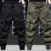 Pantaloni da uomo Pantaloni con fascia alla caviglia Cargo con coulisse con vita elastica Design multi tasche per gli sport quotidiani