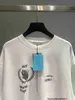 Designer Ins 21ss primavera ed estate mondo amanti della stampa di lettere a grana OS T-shirt casual a maniche corte Tee 23U5