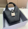 Borsa da bagno in stile secchio da donna Blocco in pelle di moda hasp designer di lusso mini tote borse da donna bara nere