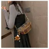 Designer Luxury Fashion Shoulder Bags Crescent Crossbody Womens Bag 2023 Ny höst/vinter mångsidig modetrend Casual Checkered Shoulder Womens Bag