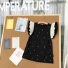 Robes de fille 2024 Arrivée d'été Filles Sans manches O Cou Volants Dot Noir Roupa Infantil Menina Mignon Robe De Soirée Custume 18M-7T