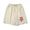 Design versátil de nicho de verão masculino, tendência americana, shorts grandes de cinco pontas, calças esportivas casuais da moda