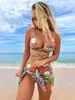 Traje de baño para mujer 2024 Conjunto de 3 piezas Traje de baño Mujeres Tanga Sexy Micro Bikini con falda Sarong Estampado étnico Ropa de playa Traje de baño