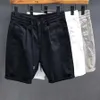 Shorts pour hommes Shorts pour hommes été shorts de rue pour hommes coréen à la mode blanc couleur unie shorts Harajuku vêtements pour hommes vente chaude pantalons de sport décontractés 24325
