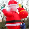wholesale Père Noël gonflable extérieur de Noël de 5 m de haut avec pour la décoration de Noël de suspension de mur extérieur de centre commercial