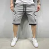 Herrmännens shorts Summer Gym Snabbtorkning Shorts Casual Fitness Street Clothing Mens Multi Pocket Sports Button Cargo 24325