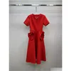 Robes de piste Milan Robe 2024 Abricot / noir / rouge V Collier Côtes courtes Femmes Designer Fleurs solides Chaîne Prom Part Robe avec ceinture D Otzqj