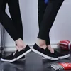 Sapatos casuais primavera coreano lona pedal masculino preguiçoso casal modelos maré branca respirável tamanho extra grande