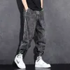 メンズジーンズルーズエラスティックウエストデニムメンズジーンズ2024ファッショナブルなカジュアルな春の作業服と脚を結んだズボンとブランドの作業服ポケットパンツ2403