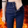 Botão voar cintura alta mais veludo magro denim calças de pelúcia quente estiramento lápis vaqueros plus size 5xl engrossar inverno jeans mulheres 240320