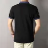 Дизайнер рекомендовал новый летний стиль!Рубашка поло из чистого хлопка с отложным воротником и уникальной привлекательной вышивкой демонстрирует мужской стиль