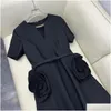 Robes de piste Milan Robe 2024 Abricot / noir / rouge V Collier Côtes courtes Femmes Designer Fleurs solides Chaîne Prom Part Robe avec ceinture D Otzqj