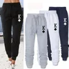 Trendige Damen-Jogginghose, Jogginghose, lockerer modischer Federdruck mit Taschen, 240309