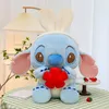 Partihandel anime tecknad film 40 cm plysch leksak stjärnkläder baby stitch dollmaskin par kudde bilmonterade tillbehör kreativa leksaker presentrum dekoration klo maskin priser