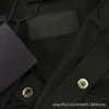 Versión alta marca de moda P familia FW nuevo logotipo triangular pareja versátil estilo Casual camisa con botones chaqueta