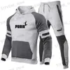 Tute da uomo Felpa con cappuccio da uomo e pantaloni set Colori di giunzione abbigliamento sportivo casual marca abbigliamento sportivo autunno e inverno Nuovi stili 2023 T240326