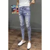 Neue Frühlings-Sommer-Cowboy-koreanische Art-beiläufige dünne Jeans feste Denim-FI-Mann-Strecken-feste zerrissene Bleistift-Hosen X7Hd #