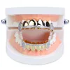 Grillz dentystyczne grille 18k prawdziwe złote czapki zęby lodowane na górnym dole wampirów kły grillowe hurtowe k3 kropla biżuteria body otzor