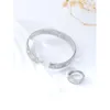 Hot Selling Fashion Trend Four Leaf Grass Pattern Jewelry Set Womens Gold Plated Ring Bracelet