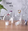 Bouteille rechargeable d'alcool en plastique de coeur d'amour vide 50 ml bouteilles transparentes transparentes de désinfectant pour les mains en PET avec crochet porte-clés facile à Ca4984263