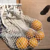 Sacs de rangement Boutique Sacs à main Shopper Tote Mesh Net Tissé Coton String Réutilisable Fruit Sac à main Accueil Drop Livraison Jardin Ménage Org OTM52