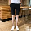 vente d'été mince homme shorts occasionnels fi mince mince couleur unie de haute qualité respirant mâle cinq points pantalons P4jM #