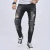 Jeans da motociclista da uomo Jeans strappati strappati Jeans a matita skinny da moto Pantaloni da uomo Pantaloni alla moda in denim casual con fori maschili 240322