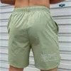 Hommes Shorts chauds légers pantalons courts minces en cours d'exécution Squat Fitn Shorts hommes vêtements de sport Shorts à cordon de serrage à séchage rapide T6Om #