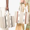 Womens large shop tote Woody bag 3size luxury handbags mens mini top handle Beach Shoulder designer bag fashion best seller canvas nylon clutch Crossbody diaper bags