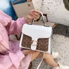 La tienda Venta al por mayor Bolsos de diseñador Bolsa especial para mujer Nuevo Dios del vino Solo hombro Crossbody Mano Empalmado Sobre Axila