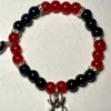 Bracciale con ciondolo abbinato a ragno