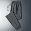 Summer Ice Silk Elastyczne spodnie dla mężczyzn cienki modny pasek prosta rurka Summer Szybki suszenie oddychające sportowe spodnie 24ss#