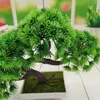 Dekorativa blommor Simulerad växtpott mini grön krukut bonsai gäst-ögonsimuleringsgäster