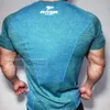 T-shirt manches courtes pour hommes, haut d'entraînement, pour gymnases, musculation, peau serrée, thermique, 502B #