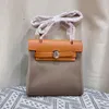 MINI Totes Bolso de diseñador Bolso para mujer Lona de cuero de alta calidad que empalma el bolso de mano Bolso de moda Bolso con forma de casa Bolsos de mano de lujo