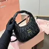 Sacchetta da sera designer femminile mui spalla una borsa di lusso sotto la chiusura della cerniera ascricata ascrota