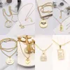 Moda Mujer Carta clásica Collares pendientes 18K Oro Plata Plateado Cristal Perla Rhinestone Suéter Newklace Diseñador de lujo Fiesta Joyería de boda al por mayor