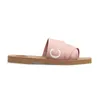 2024 Designerskie sandały drzewne dla kobiet muły płaskie slajdy światło opalenizna biała czarna różowa koronkowa literowa tkanina płócien