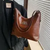 Sac à bandoulière de marque à prix réduit pour femmes, grande capacité pour les déplacements quotidiens, fourre-tout en cuir à bandoulière unique