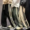 2024 uomini pantaloni larghi di velluto a coste a strisce laterali uomo streetwear coreano fi pantaloni cargo vintage hip-hop casual pantaloni larghi N95P #