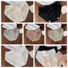 Kvinnors trosor bokstäver Ice Silk Cotton Crotch Ultra Thin Seamless underkläder Japansk stil Underkläder Mitt midja Briefs Girls