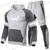 Tute da uomo Felpa con cappuccio da uomo e pantaloni set Colori di giunzione abbigliamento sportivo casual marca abbigliamento sportivo autunno e inverno Nuovi stili 2023 T240326