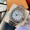 Nouveau 18k White Gold 5711 Baguette Diamond Watch 316L Bracelet en acier 40 mm pour hommes Automatic Mens Mentiers Luxury Watch New Versio308U