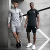 uomini Bodybuilding Sport Zipper Neck T-shirt Quick Dry Running Shirt Lg manica Compri Gym T Shirt maschile Fitn stretto Top Q6dV #