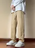 Pantalones casuales de gran tamaño para hombres Simplicidad Pantalones de color caqui sólido Cott Pantalones holgados con cordón para adolescentes Pantalones rectos clásicos X2nx #