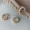Hoop Huggie New Korean gold double circular twisted pearl earrings with vintage geometric circular cuffs fake perforated pearl clip earrings 24326